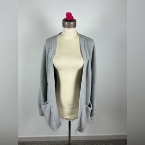 Used Aritzia grey heavy merino wool cardigan. Used condition.